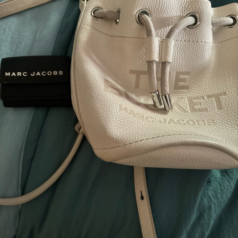 Marc Jacob’s white bucket bag and wallet